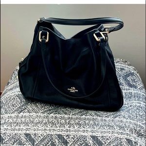 Black coach leather shoulder bag.